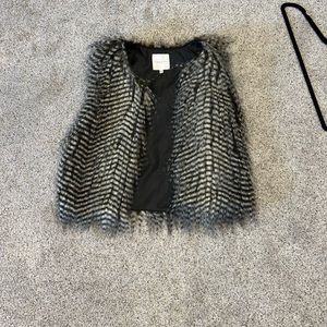 Copper Key faux furry vest! Unique and eye catching.